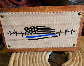 Fire Hose Sign with the thin blue line flag for law enforcement. Great police officer gift, gift for her, gift for him, or a gift for wife.