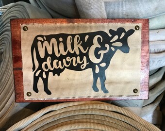 Fire Hose Sign or a farm house sign showing cow decor. Perfect farm house decor, home decor & kitchen decor. Great custom sign gift for mom