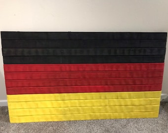 Fire Hose Flag with the German flag from Germany. Perfect wall art for home decor or wall decor. Great gift for her or gift for him.