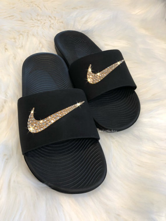 nike slides black gold