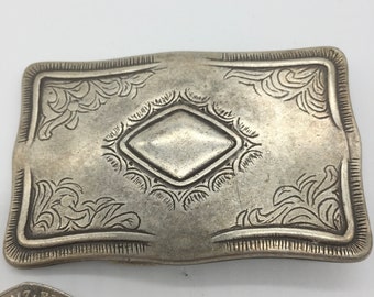 Engraved Spanish made belt buckle.