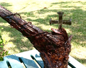 Tree stump wooden and steel sculpture.
