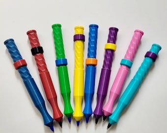 May include: Nine colorful pens with a spiral design and a black ring near the top. The pens are arranged in a fan shape with the tips pointing towards the center.