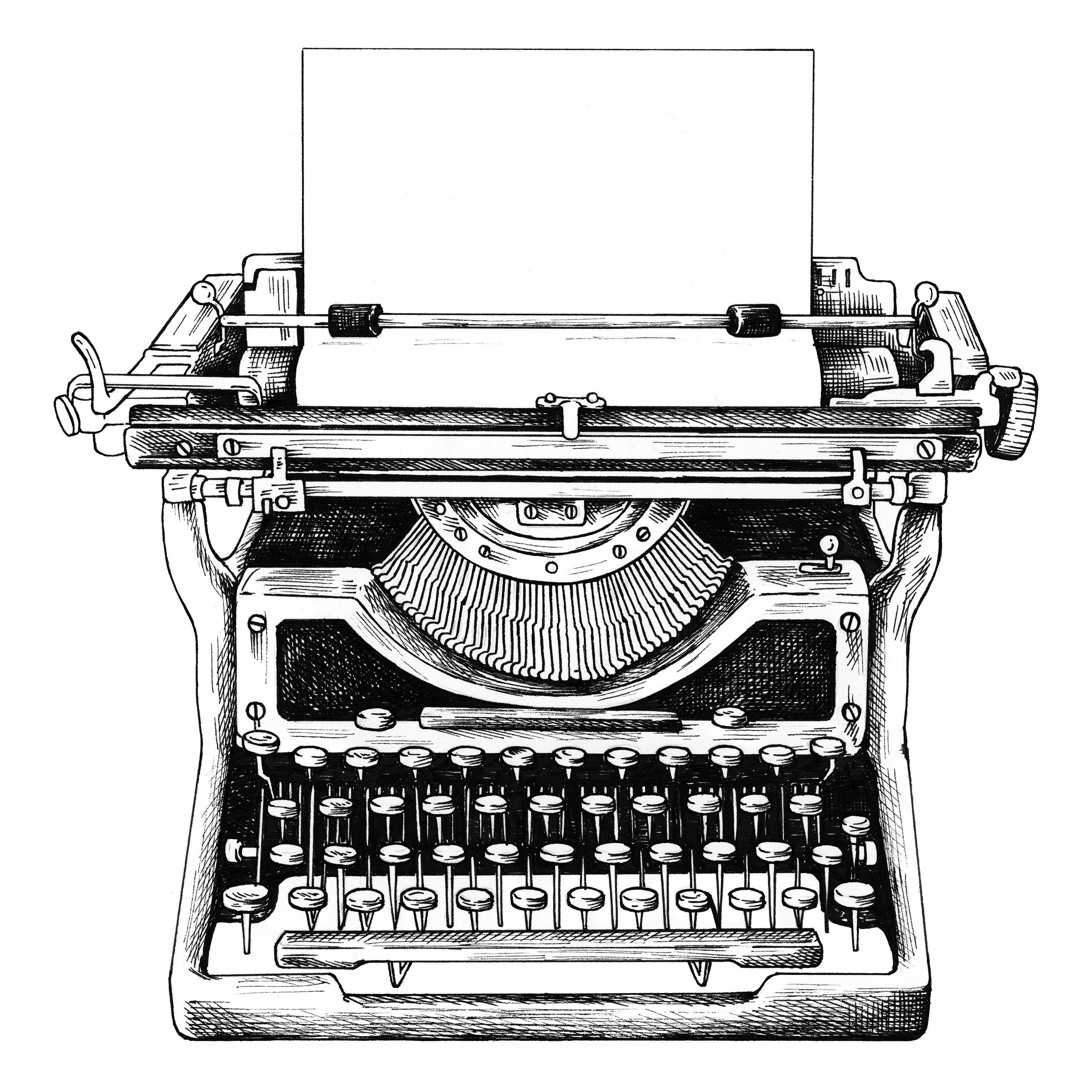 Old black typewriter with paper