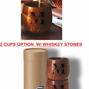 May include: Wooden whiskey cups with the name "MIGUEL" engraved. The image shows a single cup being filled and a set of two cups with a cylindrical container and whiskey stones. Text at the top reads "WHEN ORDERING SELECT FROM THE FOLLOWING OPTIONS".