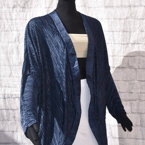 Sheer navy blue accordion pleated luxe cocoon kimono cover up jacket . Open front placket,dropped shoulders, unlined. 3/4 sleeves. Washable.