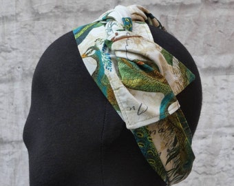 Cotton headband patterned in joyful party of peacocks in hues of green and blue. Reversible, double sided,versatile. Juneteenth