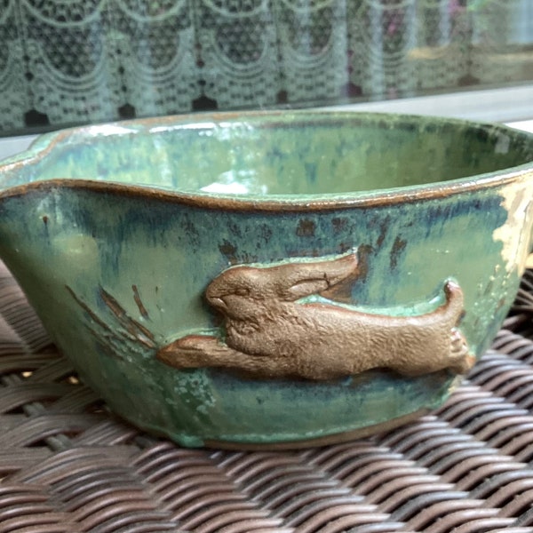 Hand Made High fired stoneware batter or pouring bowl with embossed leaping rabbit