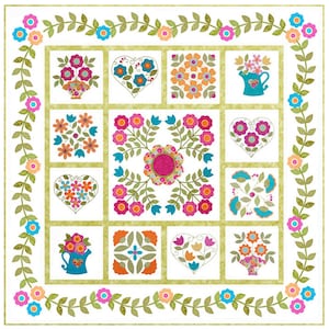 Könnte beinhalten: Ein Quiltblockmuster mit grünem Rand und weißem Hintergrund. Die Mitte des Blocks zeigt ein Blumenmuster mit rosa, orangefarbenen und blauen Blumen. Der Block ist von kleineren Blöcken mit verschiedenen Blumenmustern umgeben.