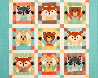 May include: A colorful quilt with a patchwork design featuring various animal characters. The quilt is made up of squares with different colored backgrounds and features a variety of animals, including foxes, raccoons, bears, bunnies, and a raccoon. The quilt is perfect for a nursery or child's room.