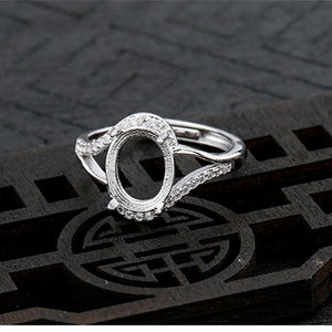 Sterling Silver Adjustable Claw Ring Blank: Oval Cabochon Setting