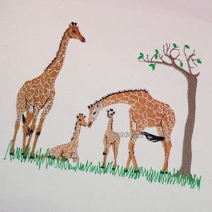 May include: Embroidered image of a family of giraffes. The tallest giraffe is brown with a long neck and spots. The other two giraffes are smaller and are also brown with spots. The giraffes are standing on a white background with green grass.