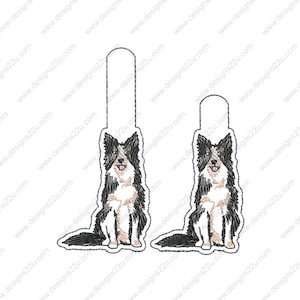 May include: Two black and white border collie dog ornaments. The larger ornament is on the left and the smaller ornament is on the right. Both ornaments are sitting with their tongues sticking out.