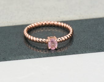 Pink sapphire spiral ring in rose gold