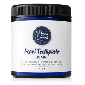 May include: A blue jar of Pam's Touch Organic Products Pearl Teethpaste - PLAIN. The label reads "Clean, Polish, Gently Disinfect, and Re-Mineralize Your Teeth" and "4 oz".