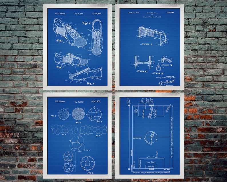 May include: Four framed blueprint-style prints featuring soccer-related diagrams. The prints include illustrations of a soccer cleat, a goal, a soccer ball, and a soccer field layout. Each print has a white border and is set against a blue background.
