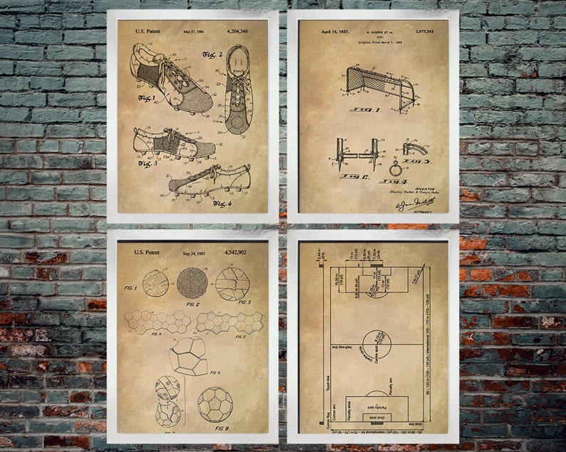 May include: Four framed vintage-style prints featuring soccer-related diagrams. The prints include illustrations of soccer cleats, a goal, soccer ball construction, and a soccer field layout. The prints are in white frames against a brick wall.