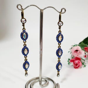 Very elegant,delicate,thin,light.long dangle earrings Mihal Negrin,Vintage jewelry bronze tone,Bright blue,Sparkling iridescent AB crystals