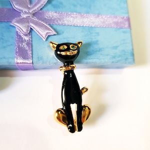 Schwarze Kat Brosche / vintage Brosche / goldfarbenes Metall und schwarze Emaille / grüne Kristallaugen / 1990 Schmuck / Produktion Israel