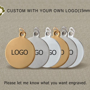 May include: Five round metal tags with a hole at the top. The first tag is gold and says "LOGO". The remaining four tags are silver and say "GO", "GO", "DO", and "DO". The text "CUSTOM WITH YOUR OWN LOGO (15mm)" is at the top of the image.