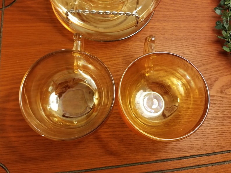 Jeanette marigold glass cups and saucers
