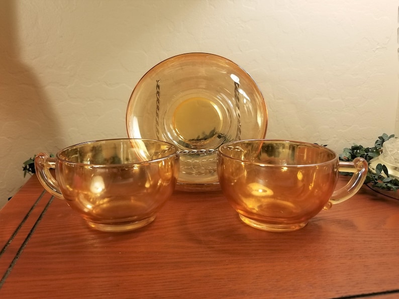 Jeanette marigold glass cups and saucers