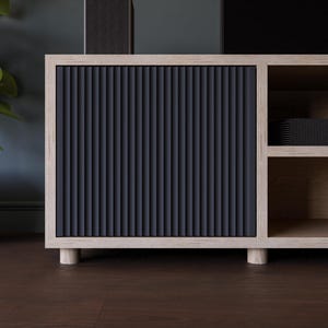 The Fluted Door TV Stand / Media Cabinet. Fluted doors, in a choice of popular Farrow & Ball colours. Made from high quality furniture grade birch ply. This one is spray finished in Farrow & Ball Railings.