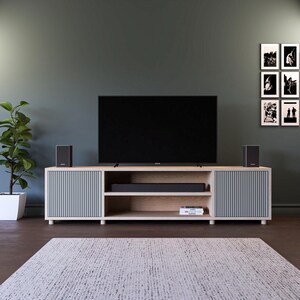 The Fluted Door TV Stand / Media Cabinet. Fluted doors, in a choice of popular Farrow & Ball colours. Made from high quality furniture grade birch ply. This one is spray finished in Farrow & Ball Pigeon.