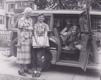 Vintage Photo, Family Trip in Wood Paneled Van, Vernacular, Boy, Girl, White Haired Women, Grandma, Suburbia, 1950s, Plaid, Loafers, Glasses