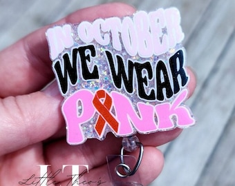 Badgehaspel met roze lint: houder borstkankerbewustzijn