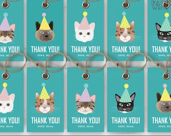 May include: Ten printable turquoise blue kitty cat thank you tags with a party hat on each cat. The text on each tag reads "Thank You!" with the words "XOXO, Olivia" below. The tags are designed for a kitty cat themed party.