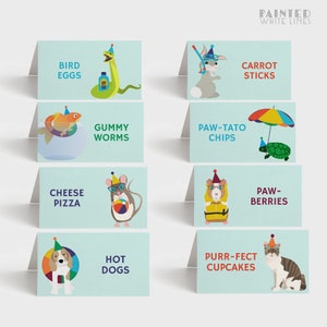 May include: Eight printable food labels featuring cartoon animals wearing party hats. The labels include the text: "Bird Eggs", "Carrot Sticks", "Gummy Worms", "Paw-Tato Chips", "Cheese Pizza", "Paw-Berries", "Hot Dogs", and "Purr-fect Cupcakes".