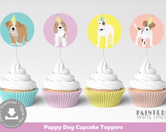 May include: Four cupcake toppers featuring different dog breeds wearing party hats. The toppers are on a white background with the text "Puppy Dog Cupcake Toppers" and "Painted White Lines" below.