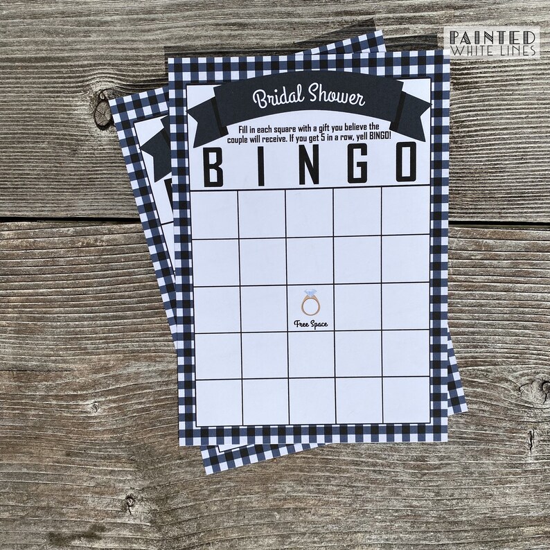 May include: Two black and white checkered bridal shower bingo cards with the words "Bridal Shower" and "BINGO" in black text. The center square says "Free Space" and has a small image of a ring.