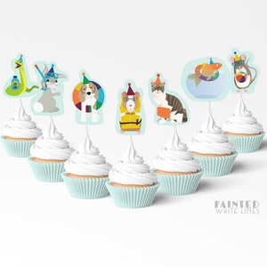 May include: Set of 7 cupcake toppers featuring various animals wearing summer accessories. The animals include a rabbit, a dog, a guinea pig, a cat, a fish, a snake, and a mouse. The toppers are printed on white cardstock and have a blue background.