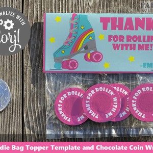 May include: Goodie bag topper template featuring a roller skate design and the text "Thanks for rollin' with me! -Emily". The template is printed on light blue cardstock with pink and white accents. There are also four pink and white circular chocolate coin wrappers with the text "Thanks for rollin' with me!" printed on them.