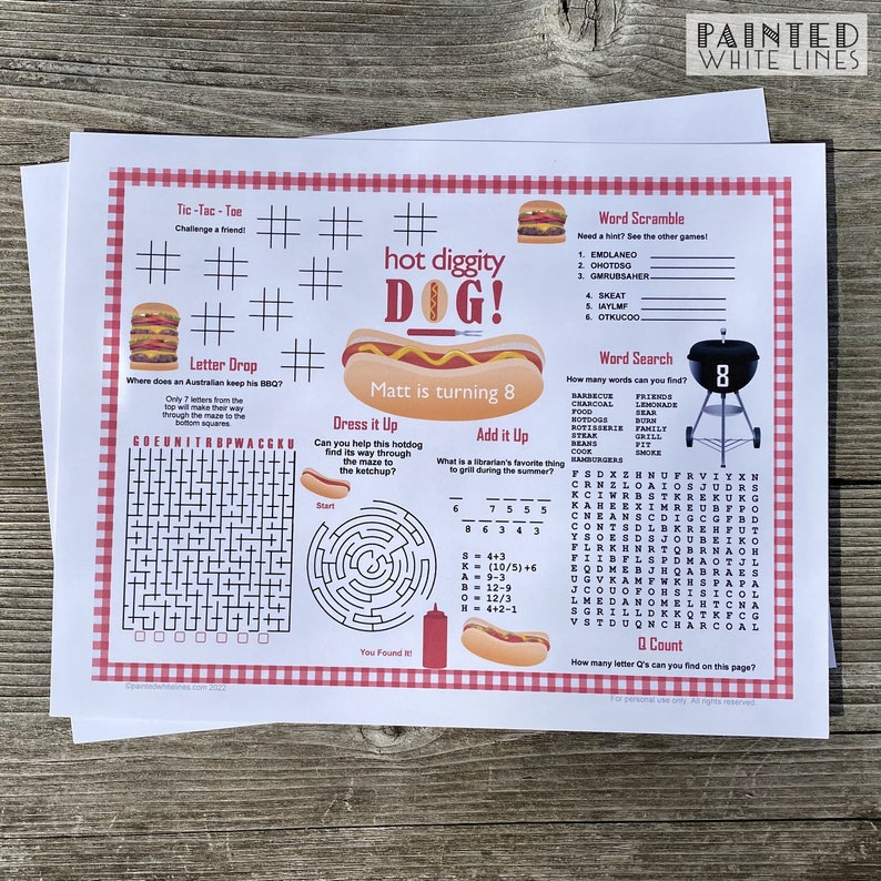 May include: A printable activity sheet with a hot dog theme. The sheet includes a word search, word scramble, tic-tac-toe, a maze, and a letter drop puzzle. The sheet is decorated with red and white checkered patterns and the text "hot diggity DOG!"