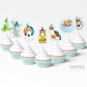 May include: Set of 7 cupcake toppers featuring various animals wearing summer accessories. The animals include a rabbit, a dog, a guinea pig, a cat, a fish, a snake, and a mouse. The toppers are printed on white cardstock and have a blue background.