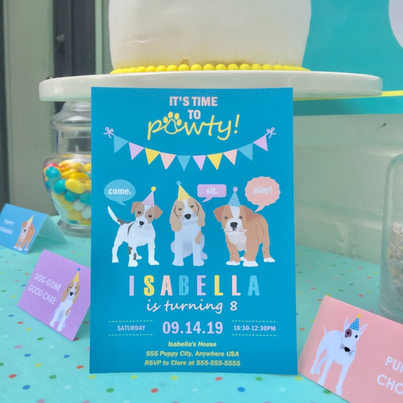 May include: A blue and pink birthday party invitation with a paw print design. It's time to pawty!  The invitation features three cartoon dogs wearing party hats and says Isabella is turning 8. The date is 09.14.19 and the time is 10:30-12:30PM. The location is Isabella's House, 555 Puppy City, Anywhere USA. RSVP to Clare at 555-555-5555.