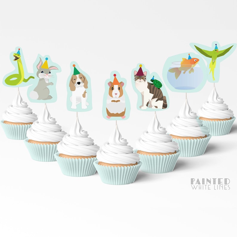 May include: Set of 7 cupcake toppers featuring various animals wearing party hats. The animals include a snake, rabbit, dog, guinea pig, cat, goldfish, and a parrot. The toppers are printed on white cardstock and have a blue background.