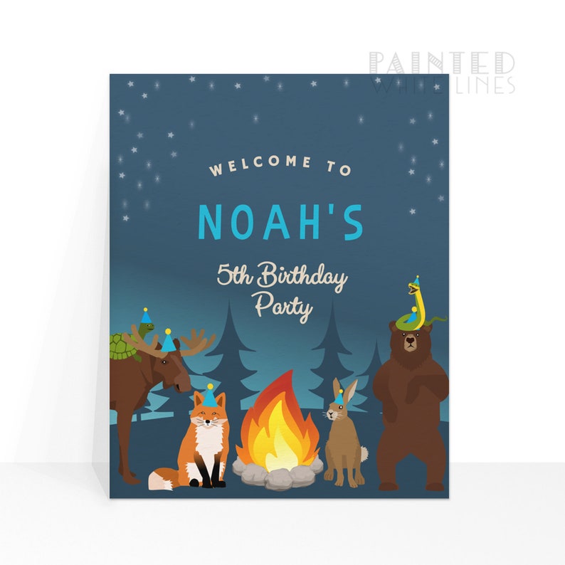 May include: A blue and white birthday party invitation with the text "Welcome to Noah's 5th Birthday Party". The invitation features a campfire scene with a moose, fox, rabbit, bear, and snake wearing party hats.