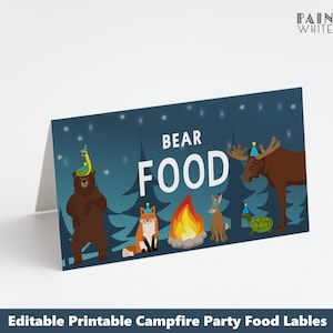 May include: Printable food labels for a campfire party. The labels feature a bear, fox, moose, rabbit, and turtle wearing party hats. The text on the label reads "Bear Food".
