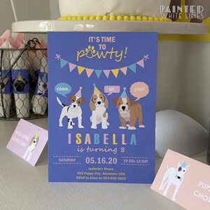 May include: Purple invitation with a paw print and the text "It's time to pawty!"  Three cartoon dogs wearing party hats with speech bubbles that say "come", "sit", and "play". The invitation is for Isabella's 8th birthday party on Saturday, May 16, 2020, from 10:30 AM to 12:30 PM. The address is 555 Puppy City, Anywhere USA. RSVP to Clare at 555-555-5555.