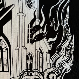 May include: Black and white illustration of a church engulfed in flames. The church is drawn in a detailed style with visible windows and a steeple. The flames are depicted as swirling smoke and fire.