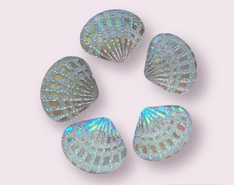 Seashell cabochons, clear, silver glitter