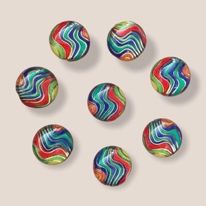 May include: Eight round, colourful glass beads with a swirling pattern of red, blue, green, and yellow.
