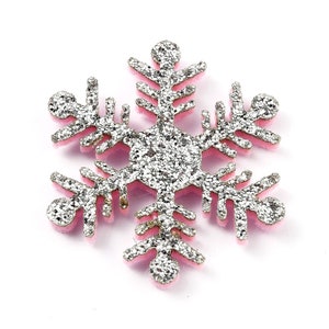 May include: A silver glitter snowflake with a pink outline. The snowflake is a festive decoration for the winter holidays.