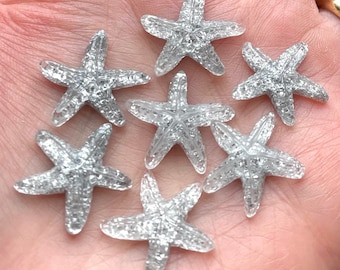 Starfish cabochons, 16mm pale silver glitter