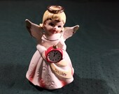 Vintage Ceramic January Angel Holding Red Clock with Gold Painted Wing Tips, Halo and Accents. Cute Hand Painted Face. Stamped Japan on base