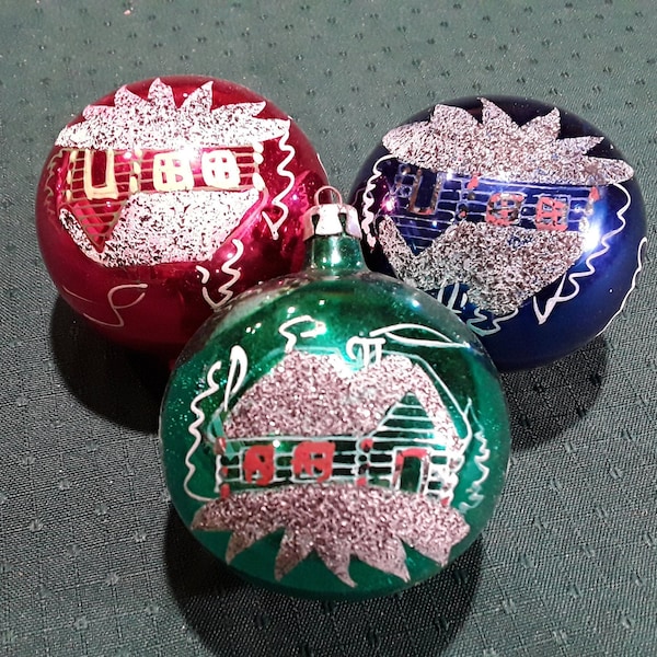 Vintage Blown Glass Christmas Ornaments, Snow Cabin scene. Decorated with Crushed Glass Glitter and Black Mica. Red, Blue and Green. 1950's.